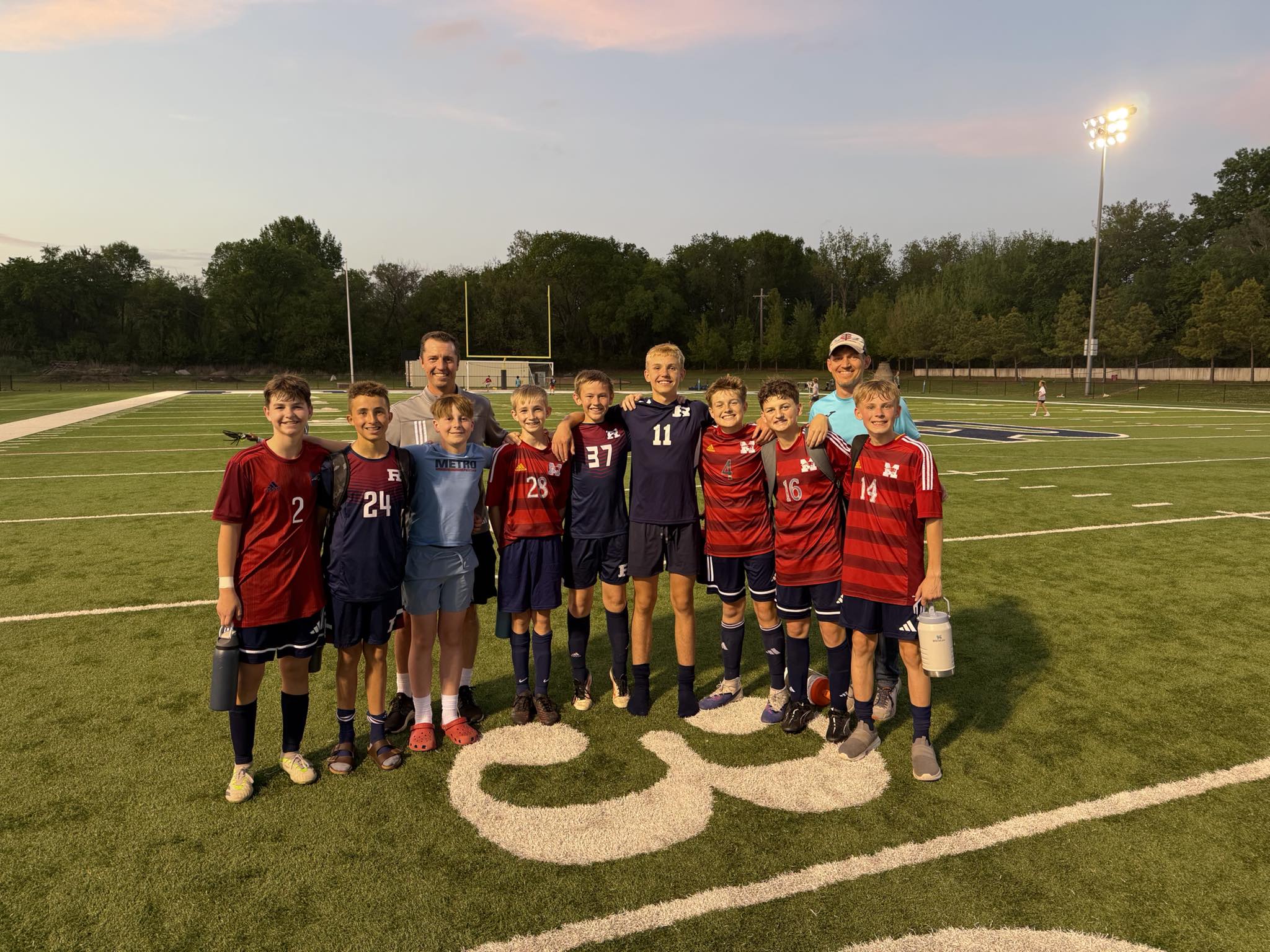 Elevate FC team at sunset